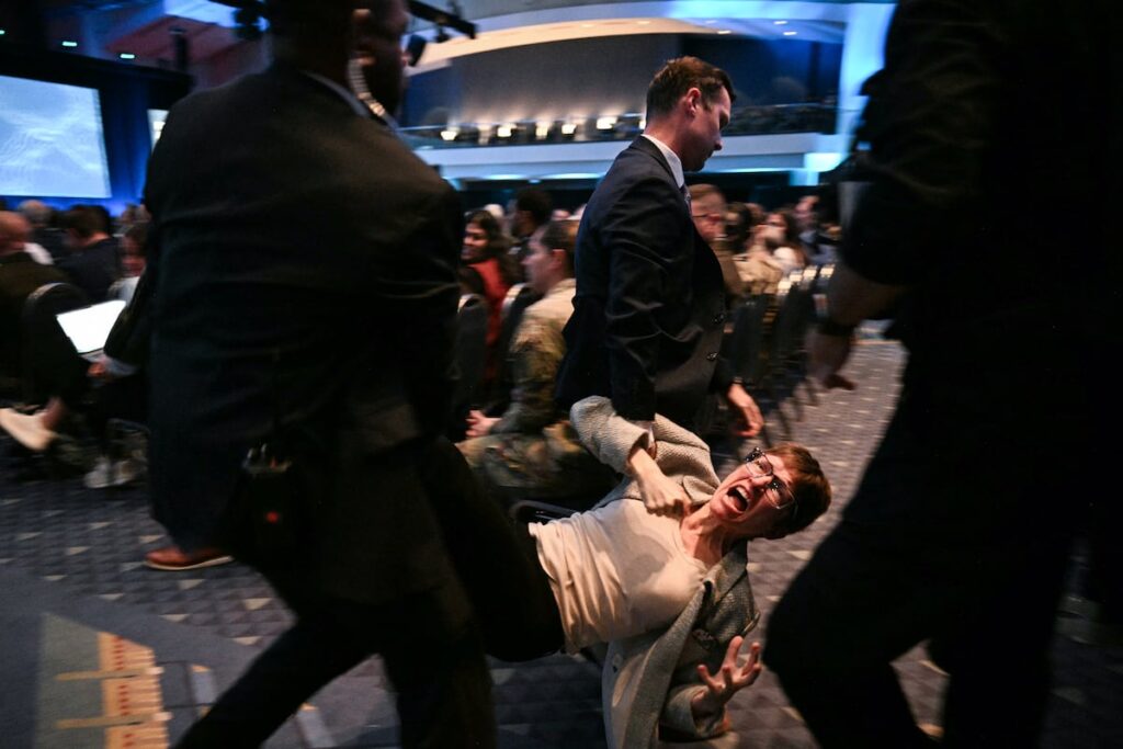 ‘You’re a coward’: Protesters heckle Hegseth during AUSA panel ‘You’re a coward’: Protesters heckle Hegseth during AUSA panel
