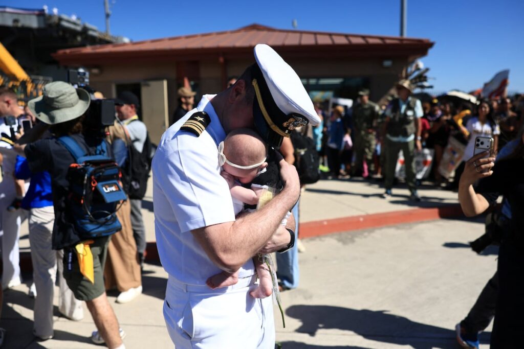 Daddy’s home!: 122 sailors aboard the Abraham Lincoln meet their children for the first time